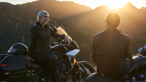 A couple on motorbikes