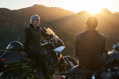 A couple on motorbikes