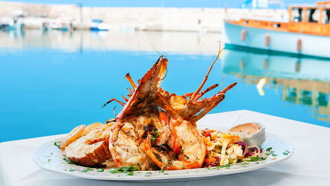Enjoying lobster in Crete