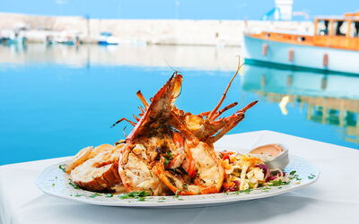 Enjoying lobster in Crete