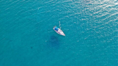 A boat in the famously blue seas of Corsica