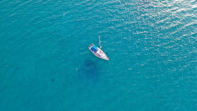 A boat in the famously blue seas of Corsica