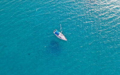 A boat in the famously blue seas of Corsica