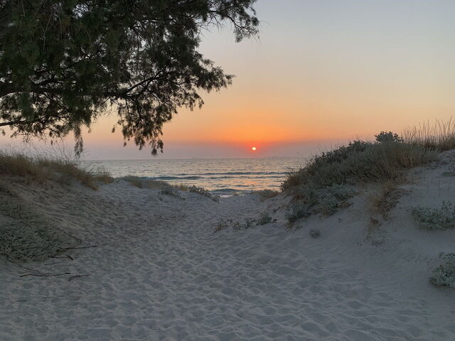 A beach at sunset on Kos