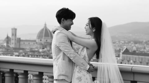 A couple taking wedding photos in Florence