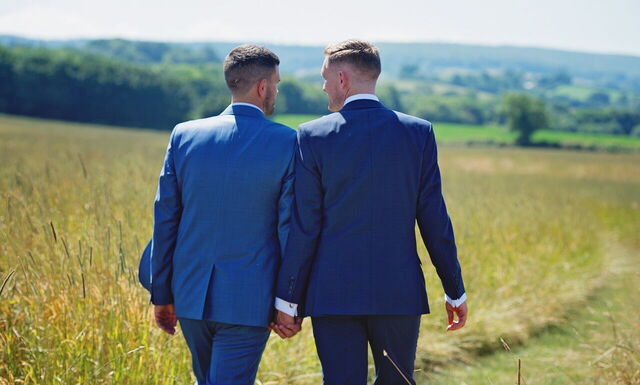 Gay couple take wedding pictures