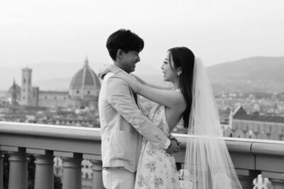 A couple taking wedding photos in Florence