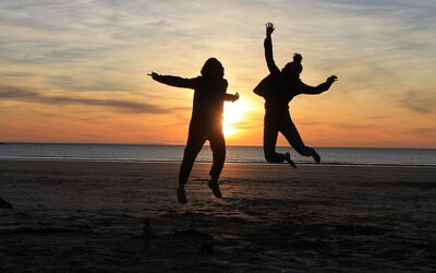 Enjoying a beach in Brittany at sunset