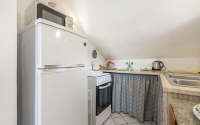 Cicladi Milos 100.2: Kitchen, Major Appliance, Kitchen Appliance, Interior Design, Flooring, Floor, Ceiling, Furniture, Countertop, Kitchen Stove
