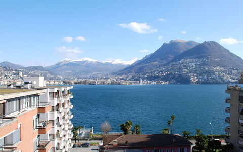 App. Paradiso: Cloud, Sky, Mountain, Water, Building, Daytime, Azure, Body Of Water, Window, Coastal And Oceanic Landforms