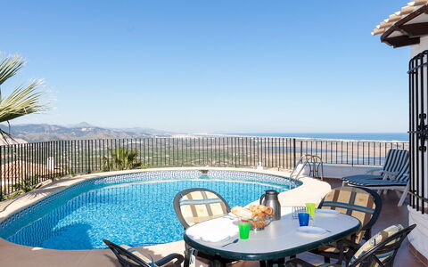 Stella: Water, Sky, Furniture, Table, Plant, Swimming Pool, Nature, Azure, Chair, Outdoor Furniture