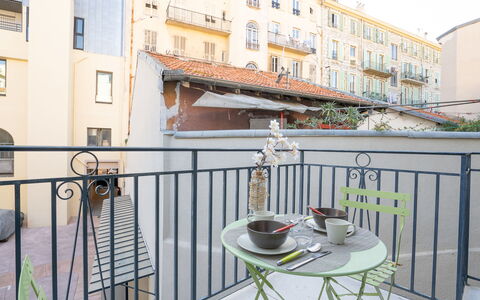 Wilson: Building, Window, Property, Table, Furniture, Flowerpot, Chair, Fence, Tableware, House