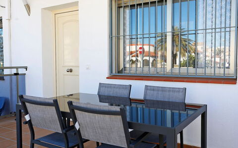 Solimar Cambrils: Table, Property, Furniture, Chair, Blue, Wood, Window, Building, Interior Design, Floor