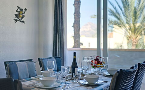 L'Ancora: Table, Tableware, Furniture, Property, White, Light, Azure, Chair, Blue, Drinkware