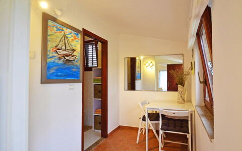 Aron: Picture Frame, Wood, Paint, Interior Design, Floor, Flooring, Window, Building, Hall, Table