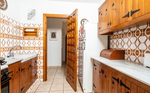 Zindel: Cabinetry, Furniture, Property, Drawer, Wood, Orange, Lighting, Interior Design, Kitchen, Flooring