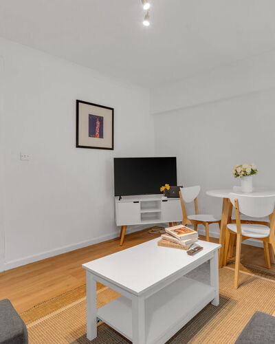 Globe View: Interior Design, Furniture, Flooring, Floor, Wood, Ceiling, Couch, Room, Wood Flooring, Living Room