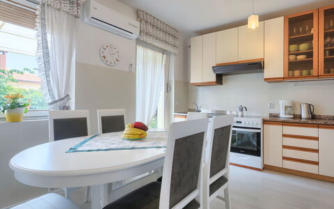 Villa Toni: Property, Room, Furniture, Building, Kitchen, Interior Design, House, Yellow, Real Estate, Cabinetry