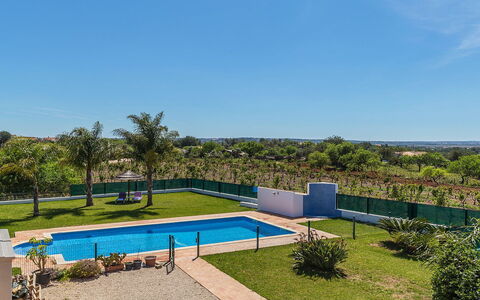 Das Amendoeiras: Water, Plant, Sky, Property, Azure, Swimming Pool, Tree, Outdoor Furniture, Shade, Body Of Water