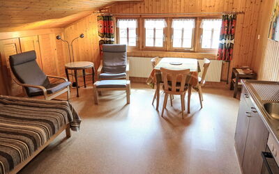 Poschthüs 3.Og Ost 50.3: Table, Furniture, Building, Wood, Flooring, Interior Design, Floor, Chair, Living Room, Hardwood
