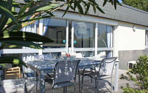 Ty Greg: Table, Furniture, Property, Plant, Chair, Building, Shade, Window, Architecture, Outdoor Table