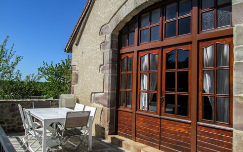 La Grange: Property, Wood, Table, Sky, Shade, Chair, Architecture, Brickwork, Brick