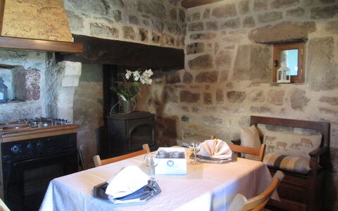Le Pigeonnier: Table, Furniture, Building, Property, Chair, Lighting, Interior Design, Wood, Picture Frame, Cabinetry