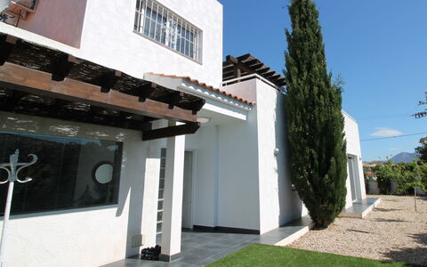 Mexico: Plant, Sky, Property, Building, Window, Tree, Shade, Real Estate, Facade, Grass
