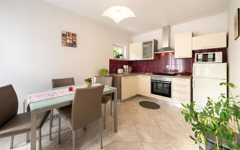 Nada: Property, Furniture, Cabinetry, Plant, Houseplant, Chair, Wood, Countertop, Table, Couch