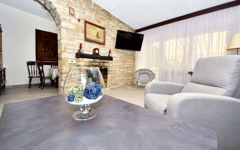 Goga: Property, Furniture, Table, Picture Frame, Wood, Building, Textile, Living Room, Interior Design, Comfort