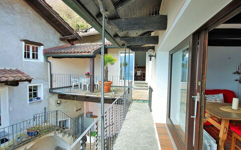 Ronco Sopra Ascona 75: Building, Wood, Interior Design, Architecture, Chair, Flowerpot, Floor, Houseplant, Table, Real Estate
