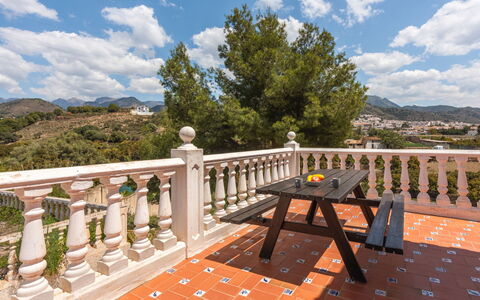 Romeral: Cloud, Sky, Property, Table, Wood, Tree, Fence, Outdoor Furniture, Natural Landscape, Vegetation