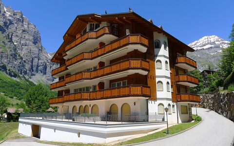 Leukerbad 480: Sky, Building, Plant, Tree, Mountain, Urban Design, City, House, Facade, Landscape