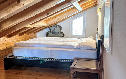 Leukerbad 480: Wood, Interior Design, Ceiling, Floor, Bedroom, Flooring, Furniture, Attic, Room, Bed
