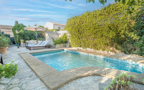 Sa Teulera: Swimming Pool, Composite Material, Flagstone, Water Feature, Garden, Shade, Landscaping, Tile, Resort, Backyard