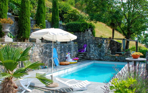 1000 e 1 Notte: Water, Plant, Property, Swimming Pool, Building, Tree, Umbrella, Outdoor Furniture, Shade, Chair
