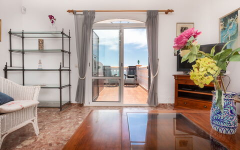 Nerja Penthouse: Flower, Property, Furniture, Building, Plant, Azure, Wood, Door, Interior Design, Architecture