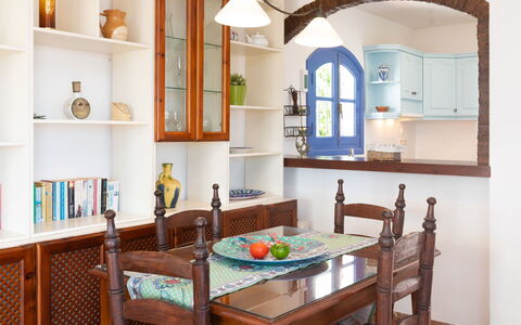 Nerja Penthouse: Table, Property, Furniture, Cabinetry, Azure, Window, Wood, Shelf, Interior Design, Lighting