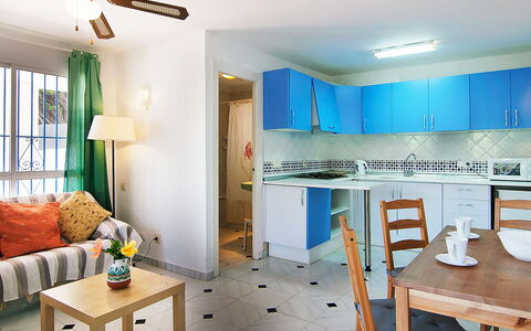 Villa Pueblo Jara: Table, Furniture, Property, Blue, Green, Azure, Couch, Wood, Interior Design, Floor