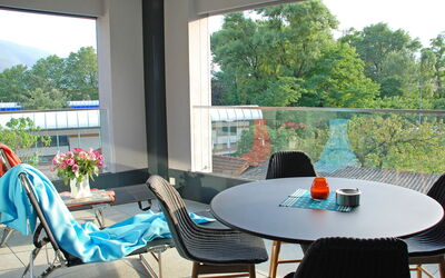 Locarno 75: Table, Furniture, Plant, Property, Chair, Window, Shade, Interior Design, Building, Lighting