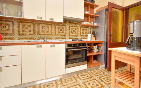 Ana: Cabinetry, Furniture, Property, Countertop, Wood, Kitchen Stove, Interior Design, Kitchen Appliance, Shelving, Kitchen