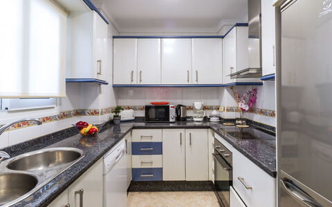Apartamentos Pueblo Valleverde: Property, Room, Countertop, Kitchen, Cabinetry, Furniture, Yellow, Building, Interior Design, Real Estate