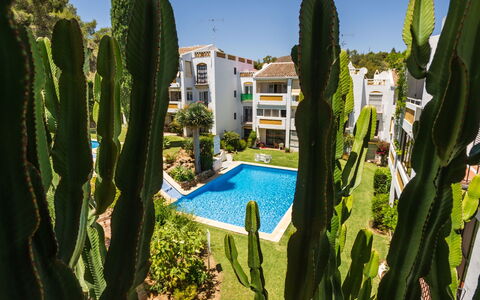 Apartamentos Pueblo Valleverde: Sky, Plant, Property, Azure, Water, Botany, Vegetation, Land Lot, Grass, Biome