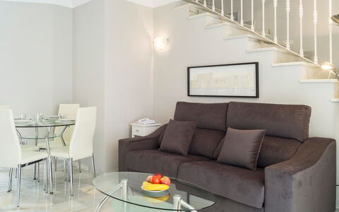 Reserva de Marbella: Furniture, Living Room, Room, Couch, Property, Interior Design, Sofa Bed, Table, Wall, Floor