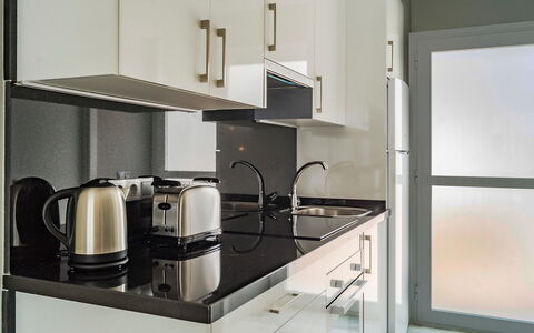 Reserva de Marbella: Room, Property, Cabinetry, Kitchen, Furniture, Countertop, Material Property, Interior Design, Kitchen Appliance, Home Appliance