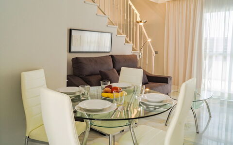 Reserva de Marbella: Room, Interior Design, Furniture, Property, Living Room, Dining Room, Curtain, Yellow, Table, Building