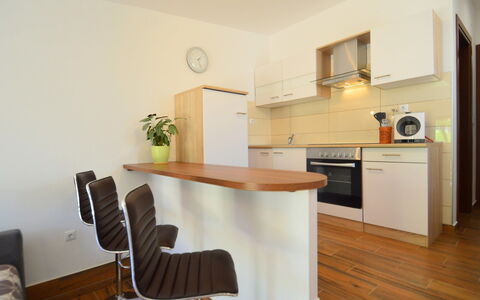 Dunja: Room, Property, Furniture, Floor, Building, Interior Design, House, Wood Flooring, Kitchen, Real Estate