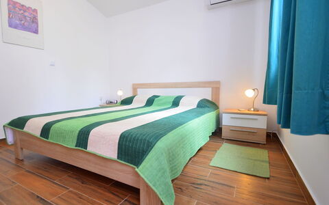 Dunja: Bedroom, Bed, Furniture, Room, Property, Bed Sheet, Bed Frame, Floor, Interior Design, Green
