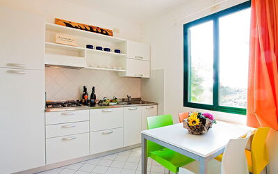 Rosselba 110.3: Room, Property, Furniture, Interior Design, Kitchen, Building, Yellow, Cabinetry, House, Countertop