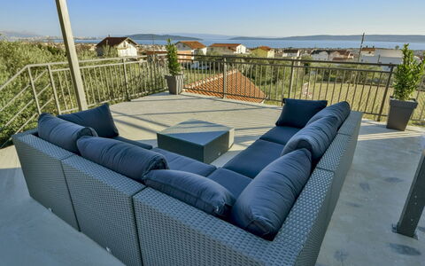 Aurora: Property, Furniture, Studio Couch, Couch, House, Room, Real Estate, Home, Table, Architecture